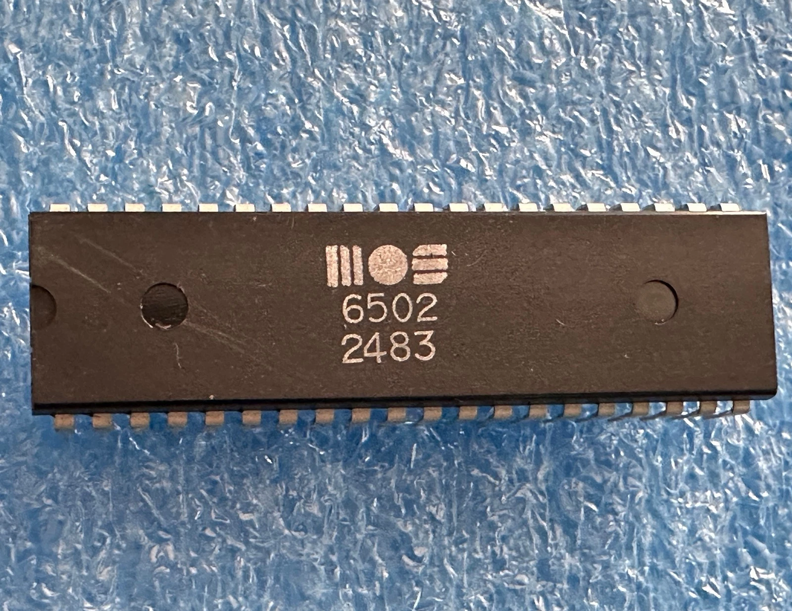 The MOS Technology 6502 microprocessor, the inexpensive chip that powered much of the early home computer era.