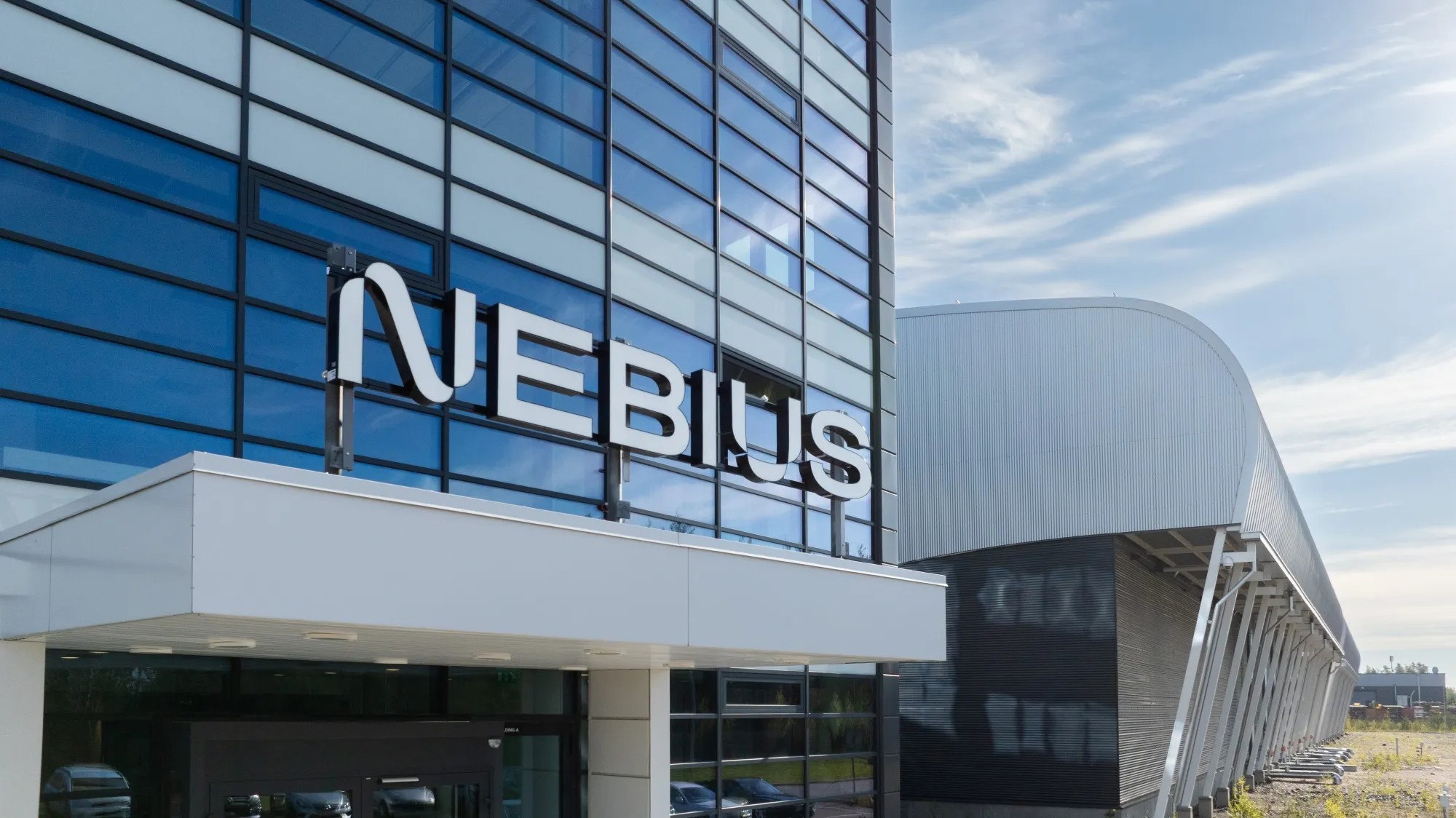 The Nebius sign on the facade of a Nebius data centre building.